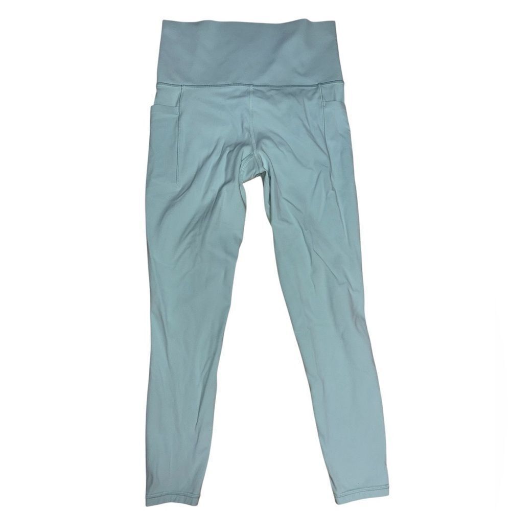 Athleta Salutation Stash Pocket II 7/8 Tight Leggings